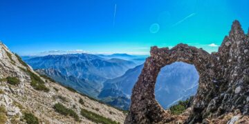 Hajdučka Vrata is a stunning natural rock formation in Blidinje Nature Park, offering breathtaking views of the surrounding mountains.