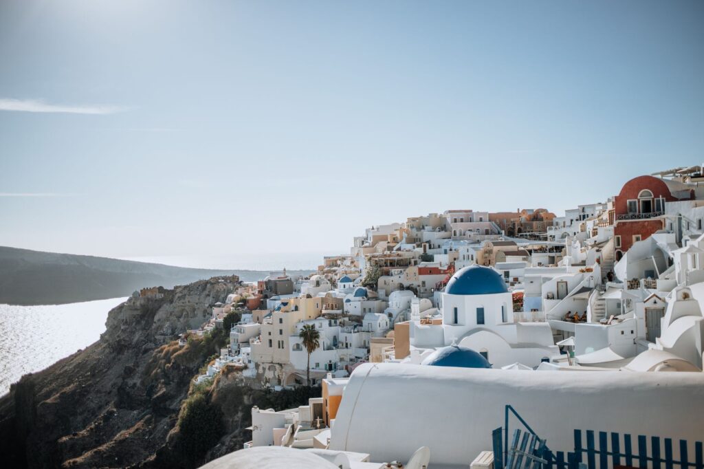 Aegean Islands, Greece — A stunning capture of Santorini's iconic white and blue buildings by the sea.