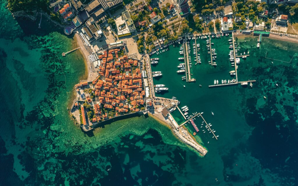 Budva, Montenegro — Stunning overhead view of Budva, Montenegro's historic coastal area and marina.