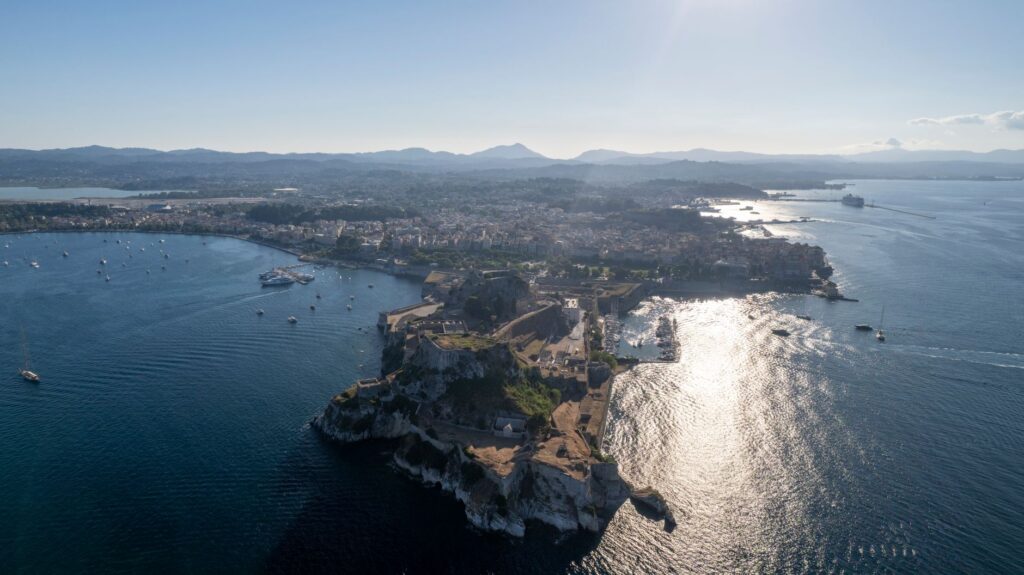 Corfu, Greece — Stunning aerial view of Corfu's coastline showcasing the island's natural beauty and the Ionian Sea.