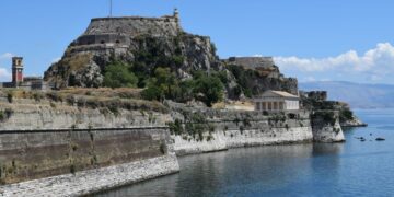 Corfu, Greece — Historic Old Fortress of Corfu overlooking the Ionian Sea under a clear blue sky.