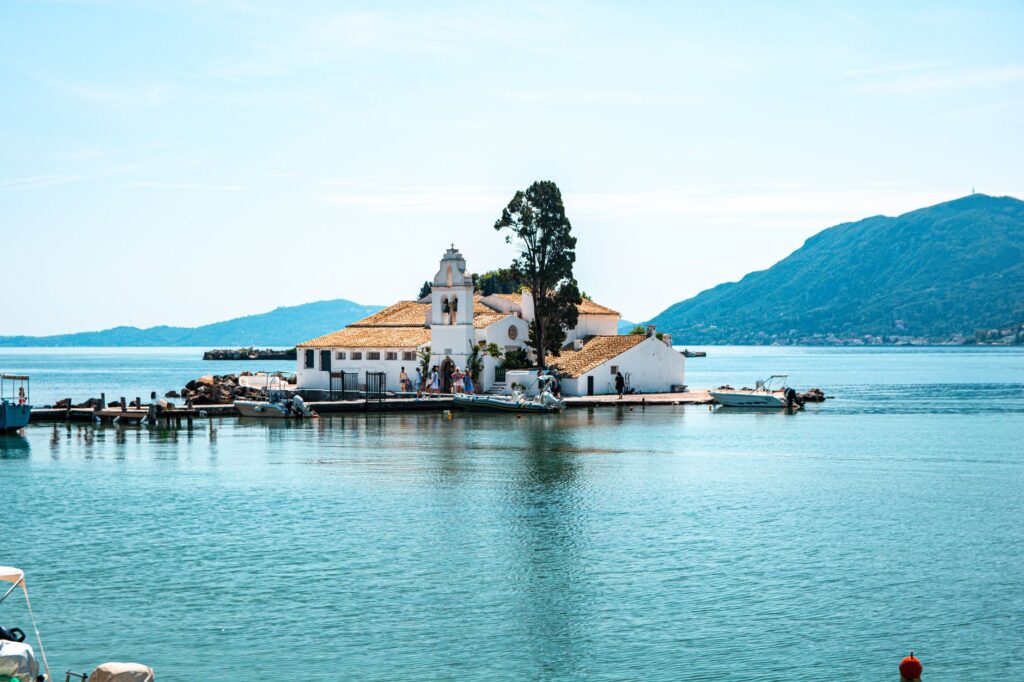 Corfu, Greece — Idyllic view of Vlacherna Monastery on a sunny summer day in Corfu, Greece.