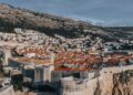 Dubrovnik, Croatia — Stunning view of Dubrovnik's medieval Old Town with iconic red rooftops and historic fortifications.