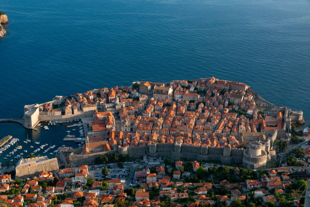 Dubrovnik, Croatia — Stunning aerial view of Dubrovnik's Old Town by the sea, encircled by ancient walls.