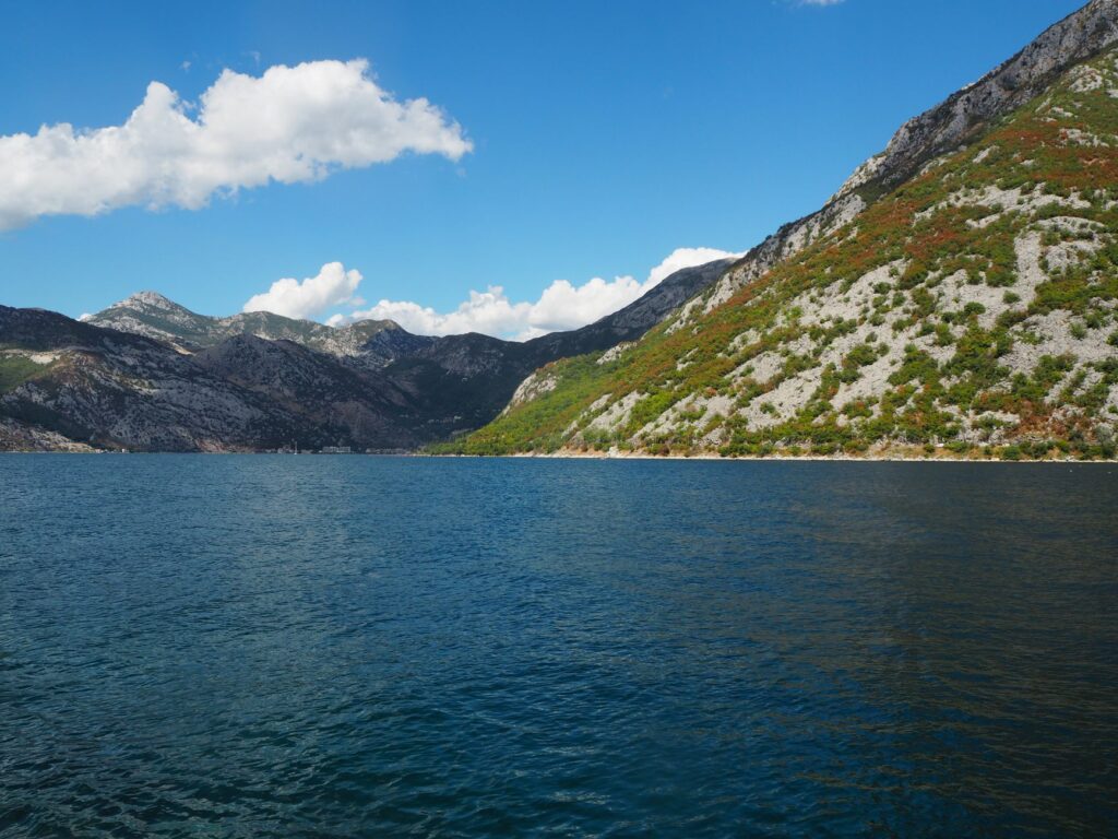 Kotor, Montenegro — Beautiful landscape of the Bay of Kotor with mountains and blue skies in Montenegro.