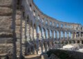 Porec, Croatia — Explore the historic Roman amphitheatre ruins in Poreč, Croatia, showcasing ancient architecture.