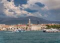 Split, Croatia — Explore the historic waterfront of Split, Croatia, featuring Diocletian's Palace and bustling harbor.