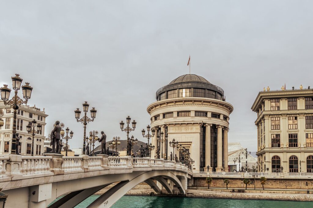 Skopje, North Macedonia — Historic bridge and architecture in Skopje, showcasing cultural landmarks and river views.
