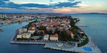 Zadar, Croatia — Stunning aerial image of Zadar, Croatia, capturing cityscape and coastline at sunset.