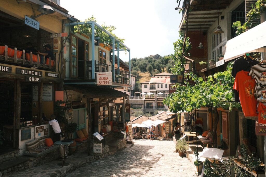 Bar, Montenegro — Explore the cozy streets of Bar, Montenegro, lined with quaint shops and lush greenery.