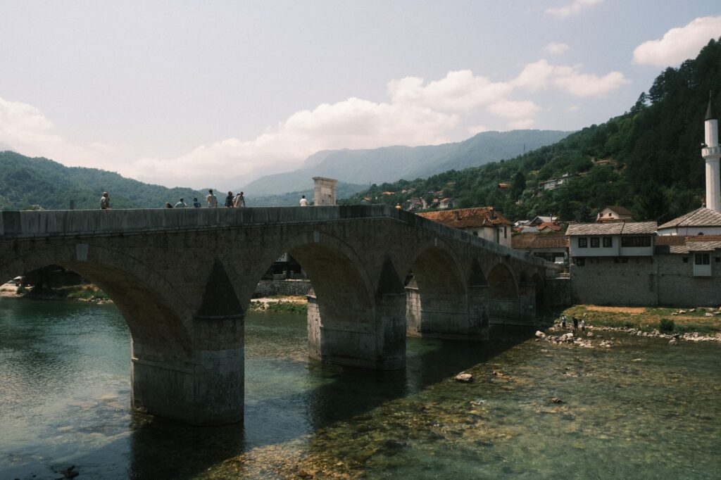Konjic, Bosnia and Herzegovina — Explore the historic Konjic Bridge in Bosnia, showcasing stunning Ottoman architecture over a serene river.